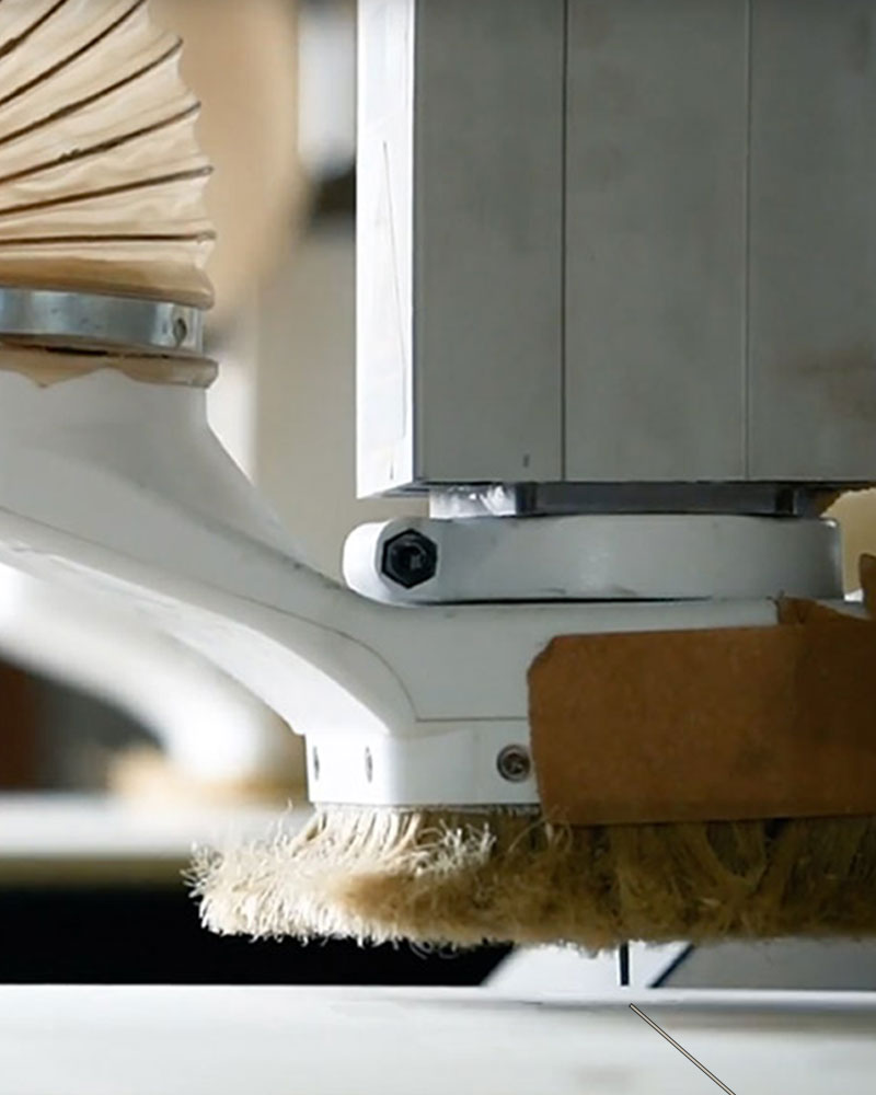 CNC machine cutting a Simple Floor in the Simple Vans workshop in France