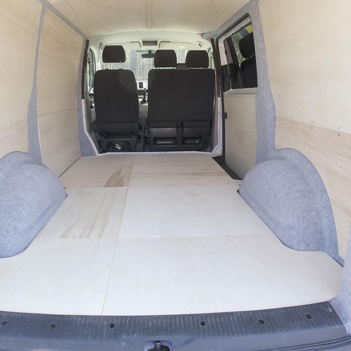 Simple Floor cut precisely around a wheel arch